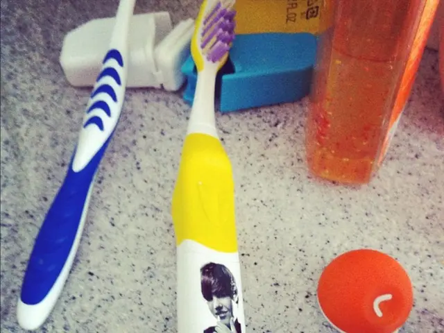 What's the right pressure to apply while brushing teeth?