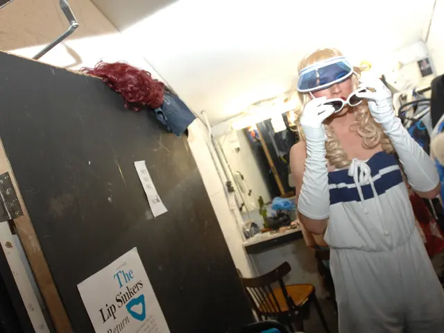 In the image there is a woman, she is wearing goggles and white dress and white gloves. she is...