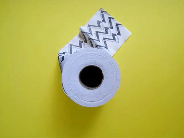 In the center of the image there is a tissue paper placed on the table.