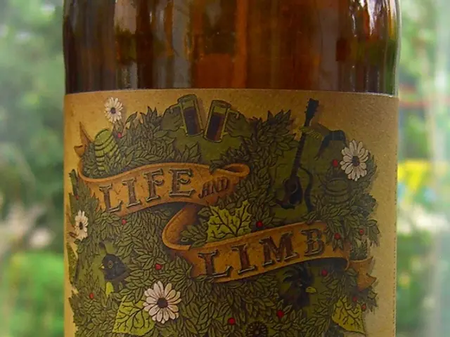 There is a bottle on a table. The bottle has a different types of sticker. we can see in the...